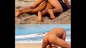 Sexo na praia nudismo com a novinha que estava tomando sol distraída