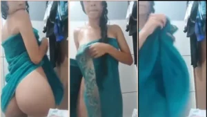 Moreninha com um corpinho de dar gosto, posando pelada logo após o banho