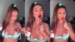 Julia Govea mostrando o peito todo lambuzado de Nutella