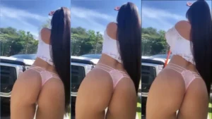 Juliana Bonde em um vídeo hot, de calcinha rosa, lavando o carro